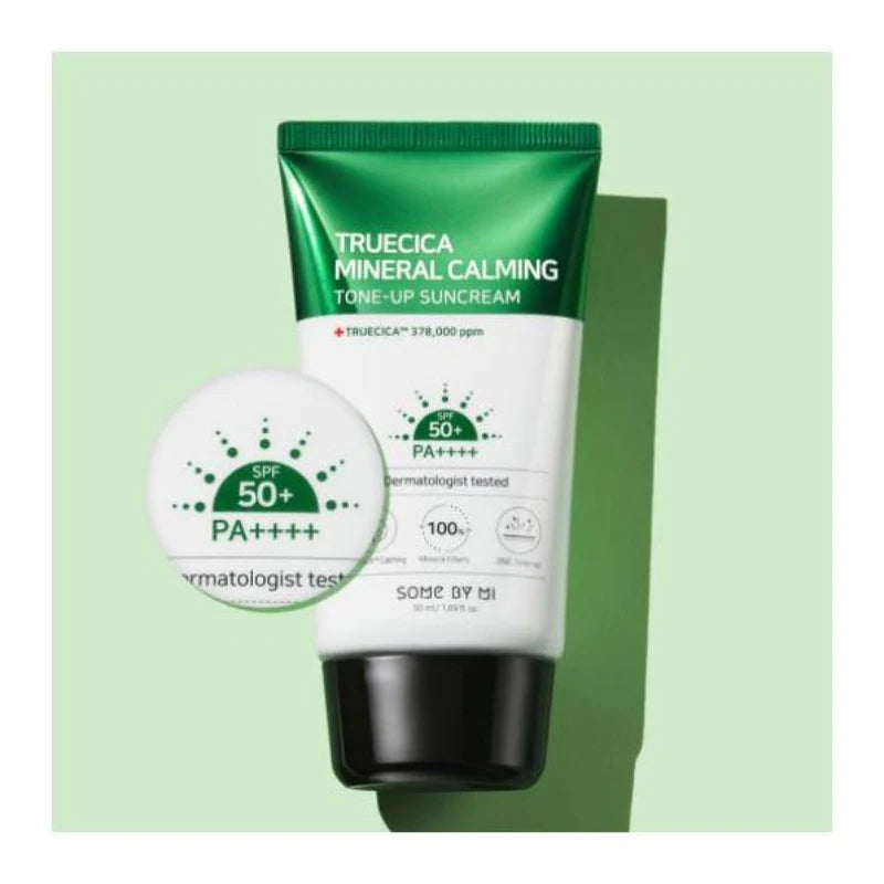 Tube of Truecica Mineral Calming Tone-Up Suncream with a green and white design on a light green background