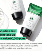 Two sunscreen products with green and white packaging on a light gray background.