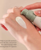 Hand applying a skincare product with text about skin benefits