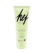 Green tube of 'hej organic' moisturizer on a white background