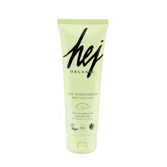Green tube of 'hej organic' moisturizer on a white background