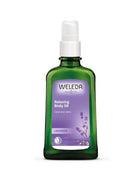 Weleda relaxing body oil bottle on a white background