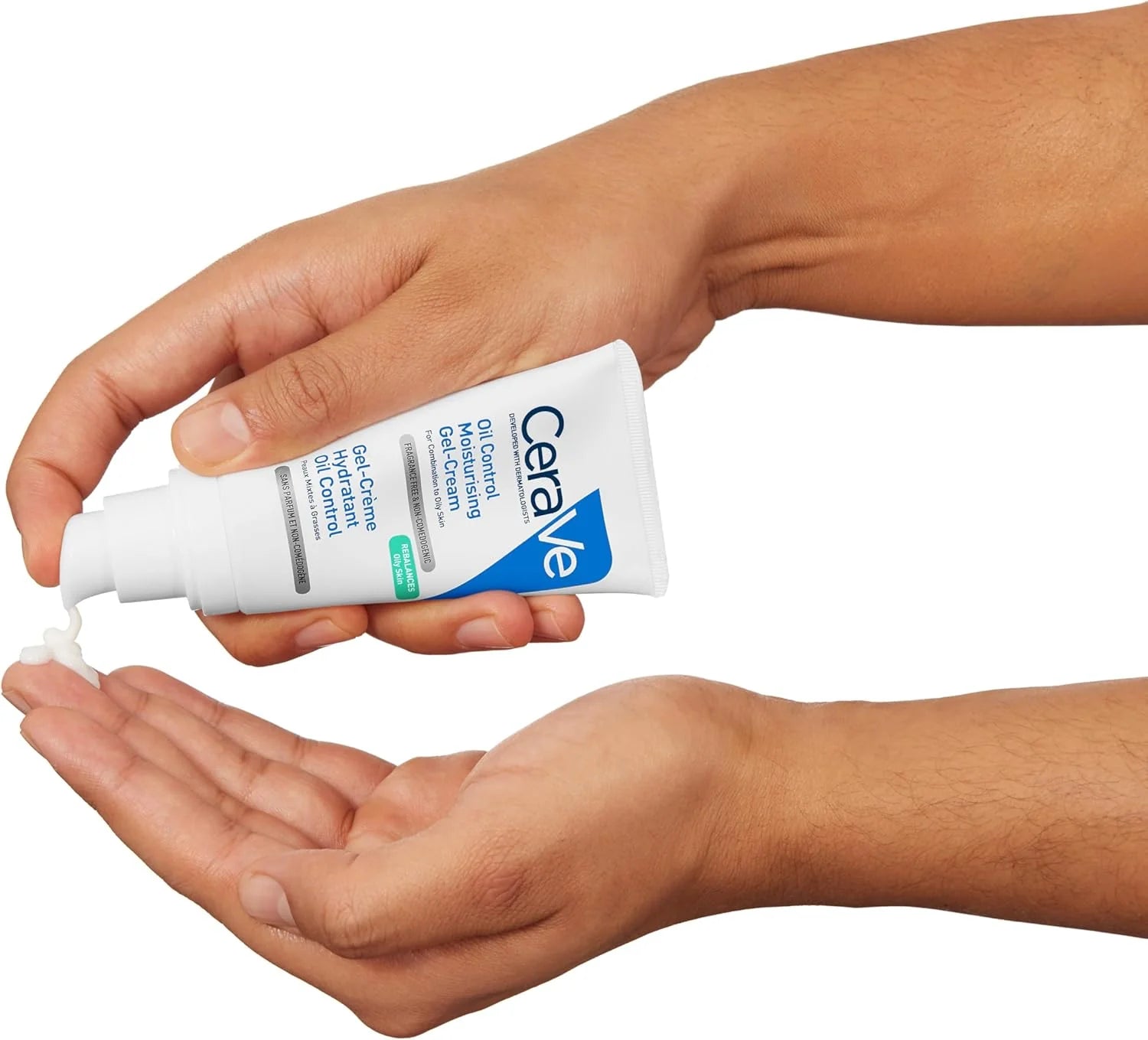 CeraVe moisturizer being applied to hands on a white background