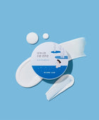 Skincare product with a blue label on a light blue background